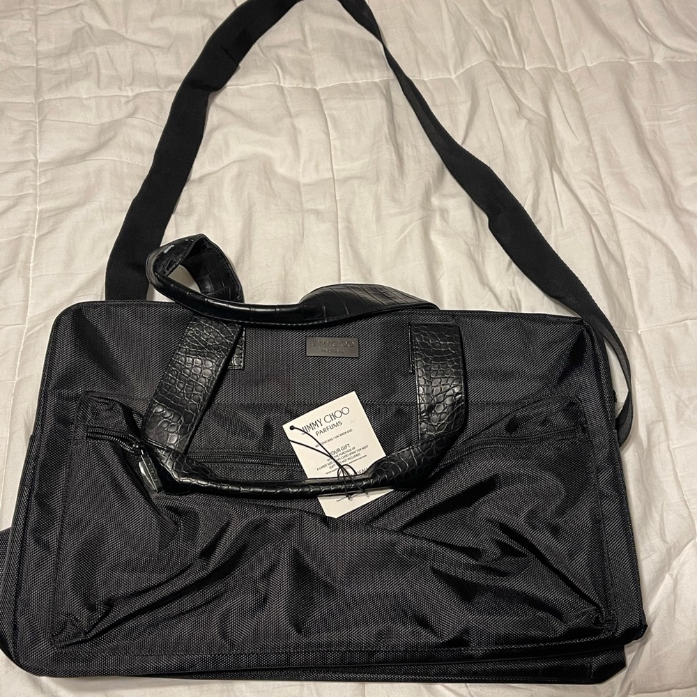 Jimmy Choo bag with leather handles